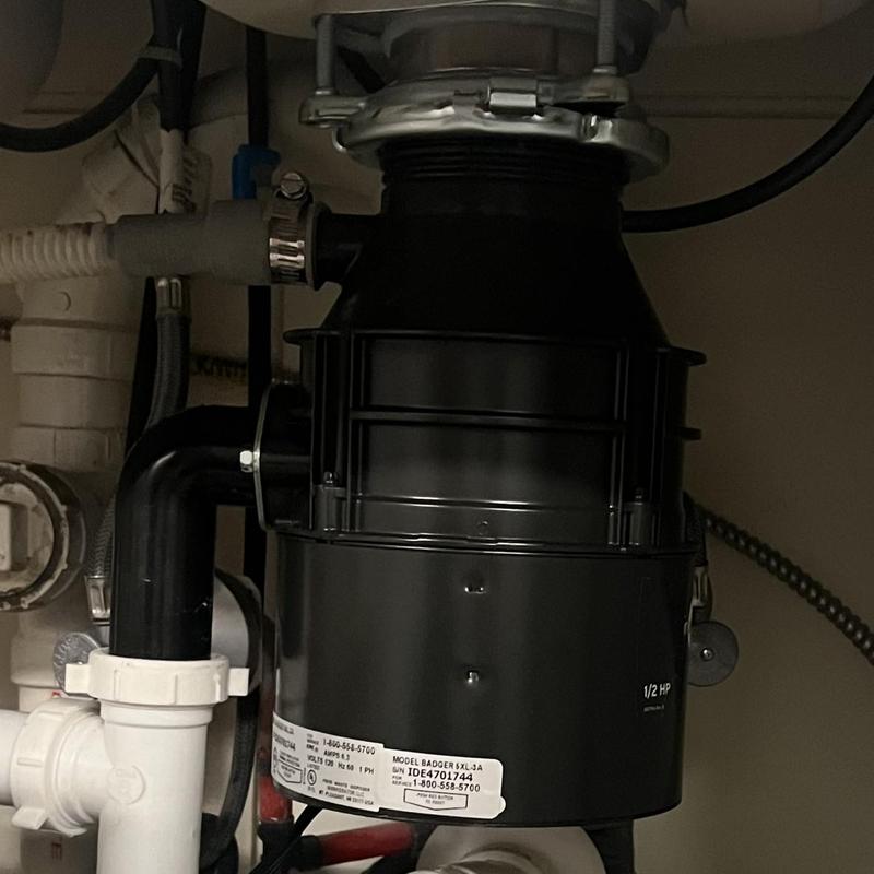 InSinkErator garbage disposal under kitchen sink installation