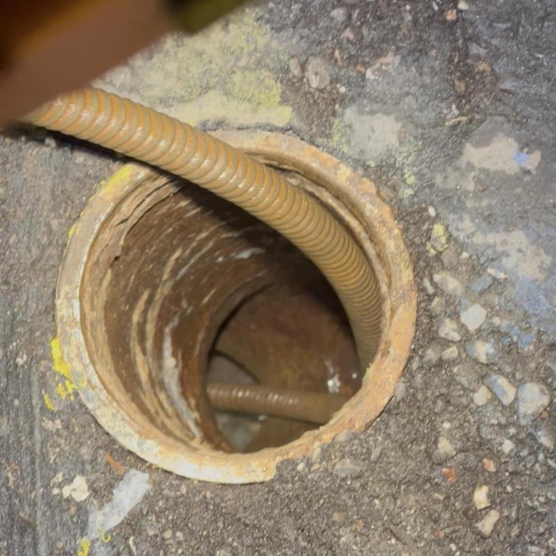 Main drain pipe cleaning with drain snake tool
