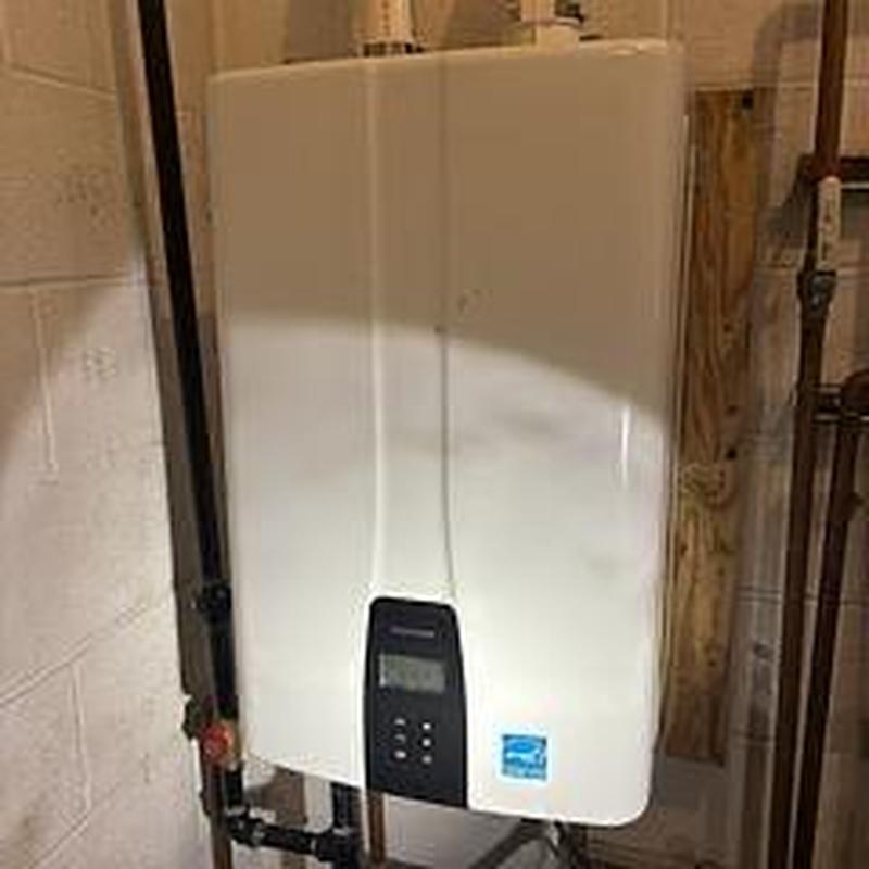 Tankless water heater testing and pipe inspection