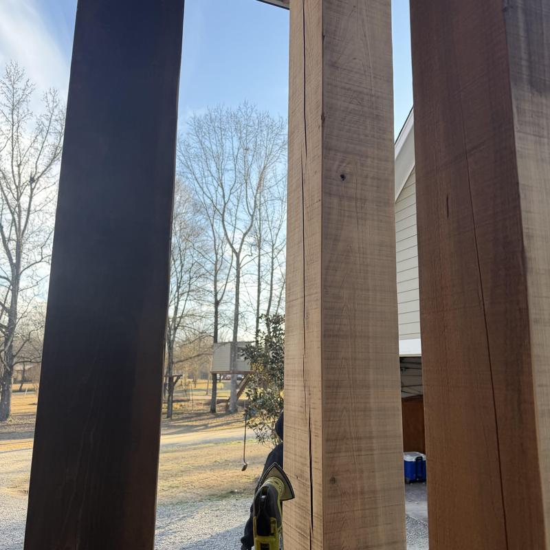 Wooden porch columns sanding for restaining Wooden porch columns sanding for restaining