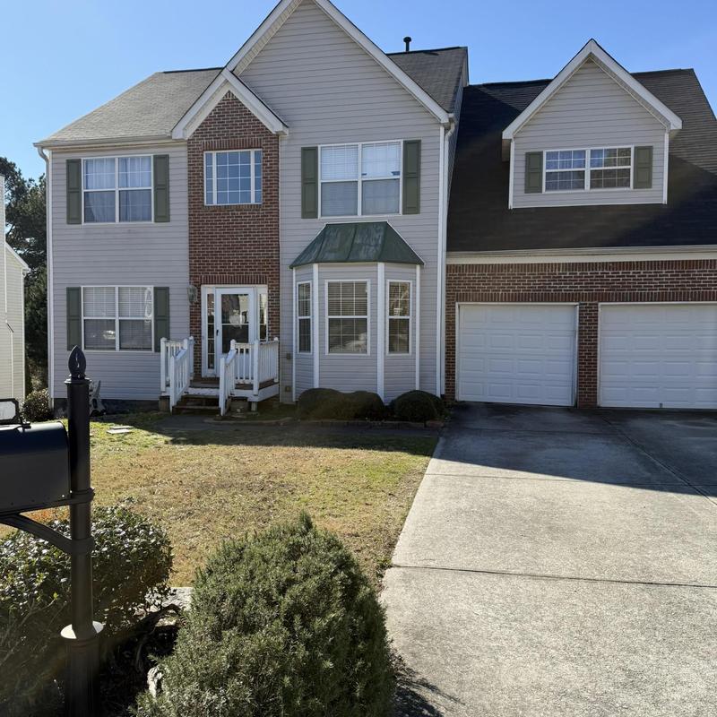 Front porch inspection at suburban home in Loganville, GA