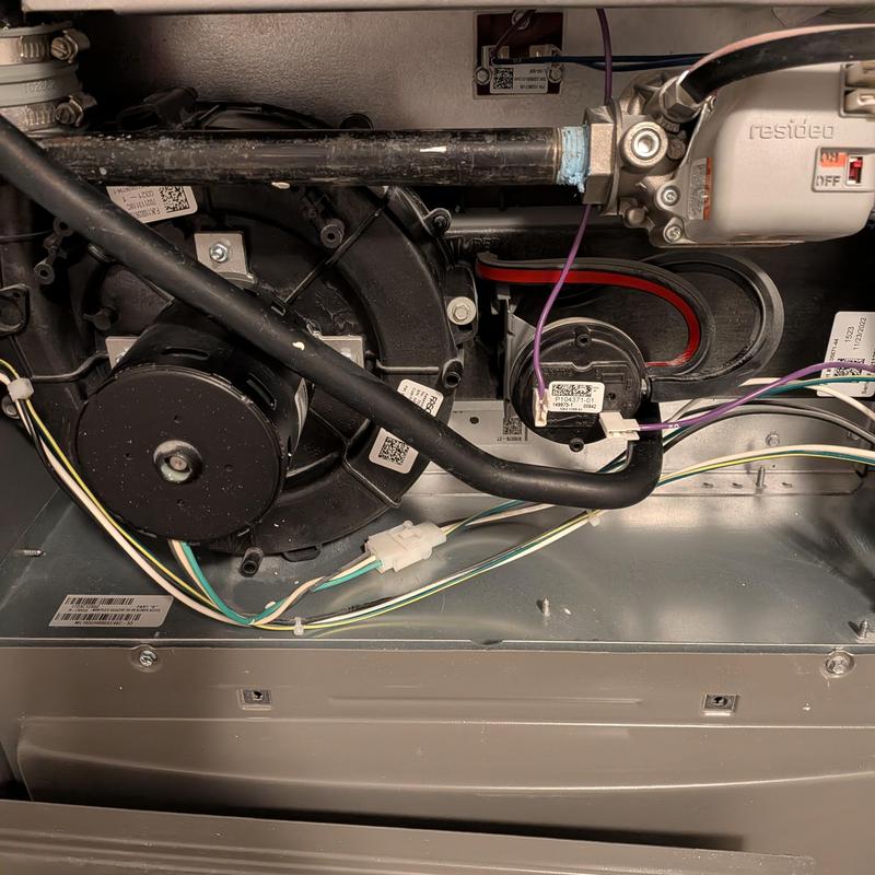 Pressure switch and blower assembly inside furnace unit