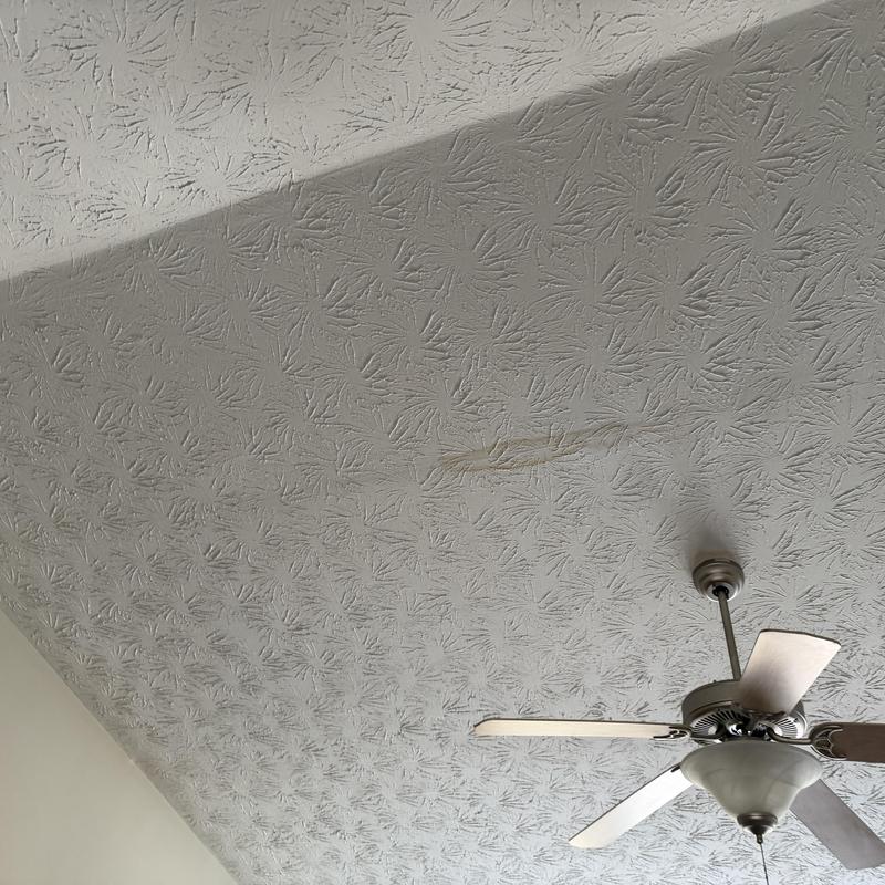 Ceiling water stain from roof box vent leak
