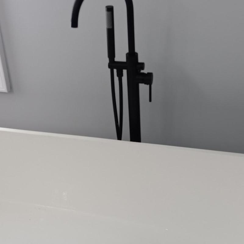 Bathtub faucet with handheld showerhead and cartridge replacement