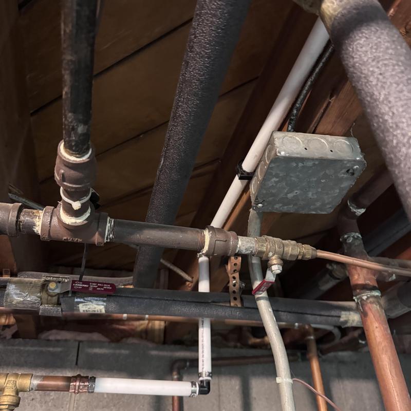 Galvanized kitchen drain with new 2-inch PVC pipe installation