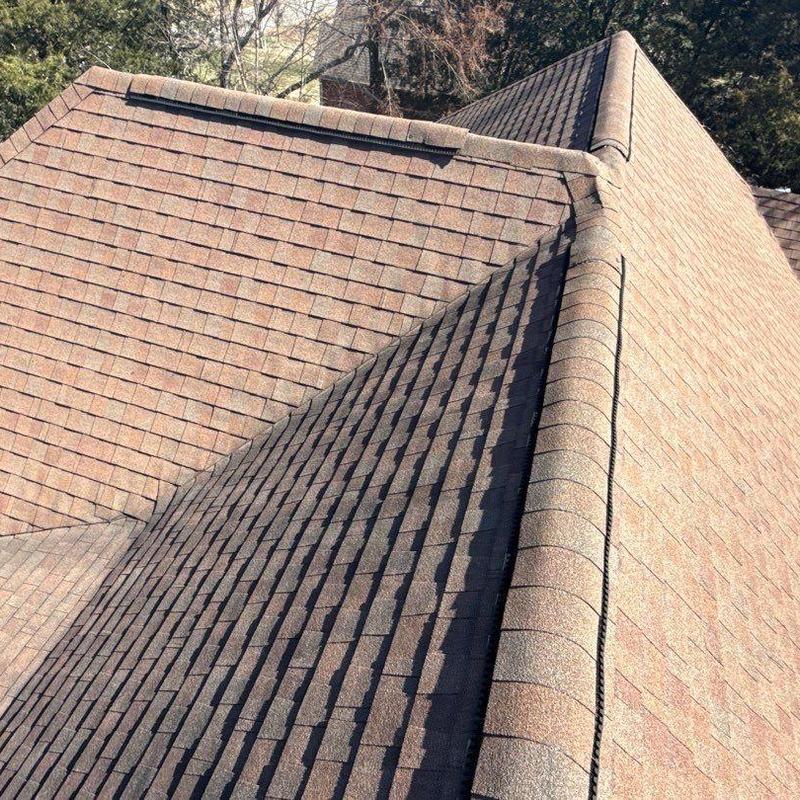 Roof shingles and ridge caps with ventilation strip