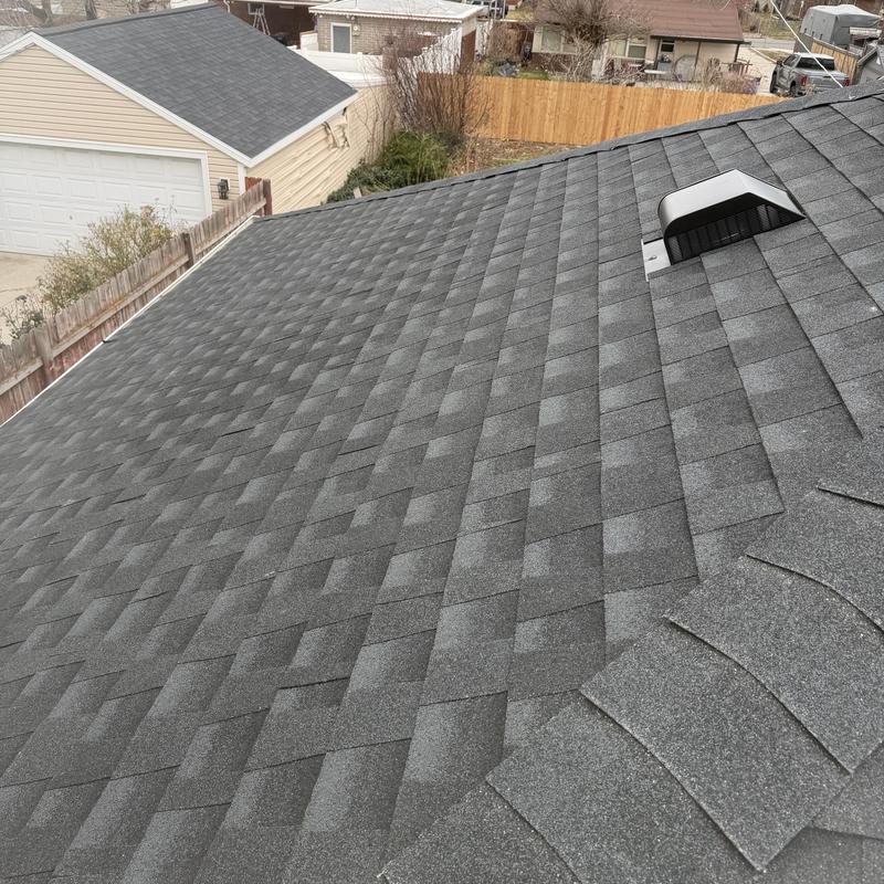 Asphalt shingle roof with ventilation vent installed Asphalt shingle roof with ventilation vent installed