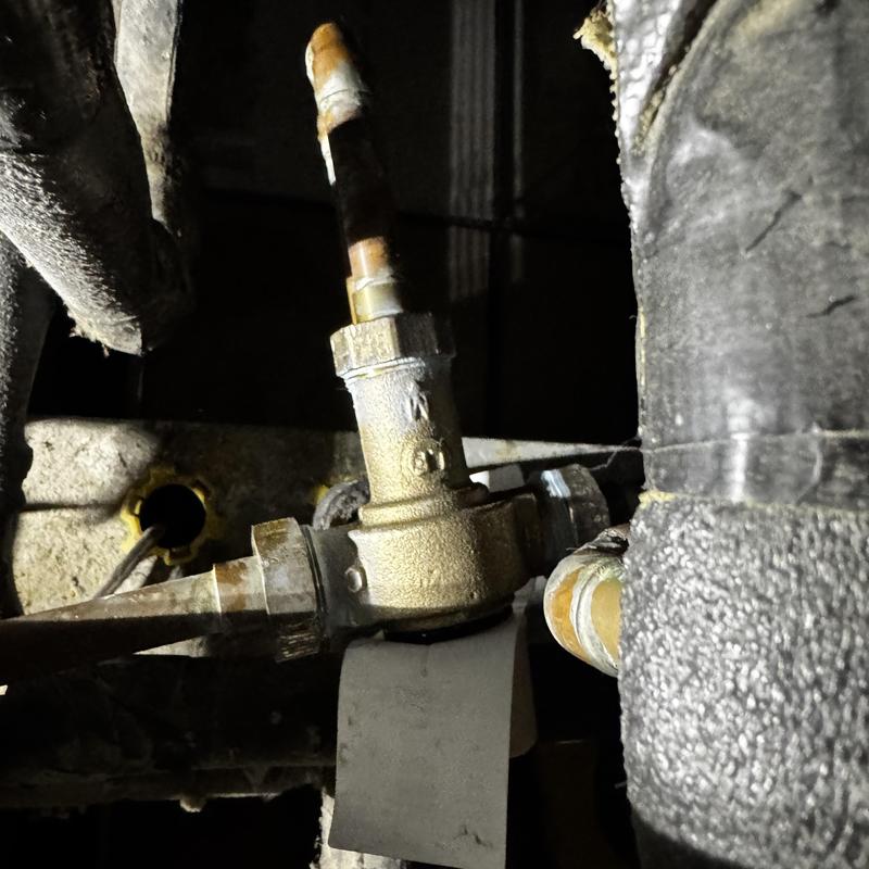 Mixing valve and connected copper piping under boiler system