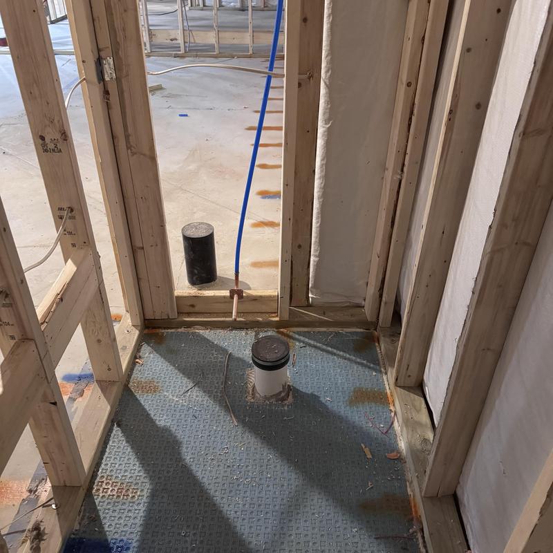 Toilet vanity and shower rough plumbing installation