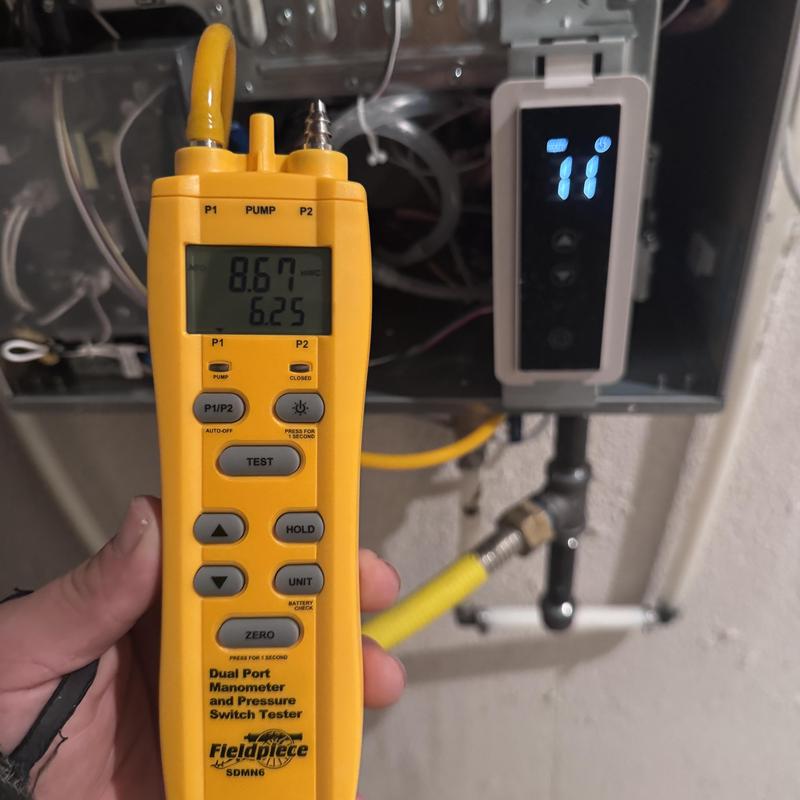 Tankless water heater gas pressure testing device