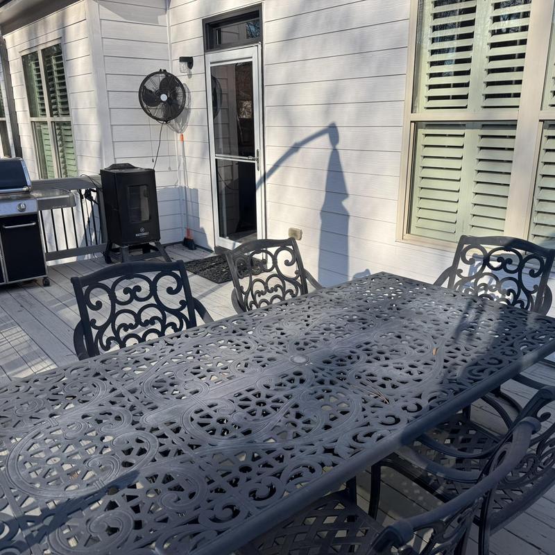 Deck floor and railing inspection with outdoor furniture