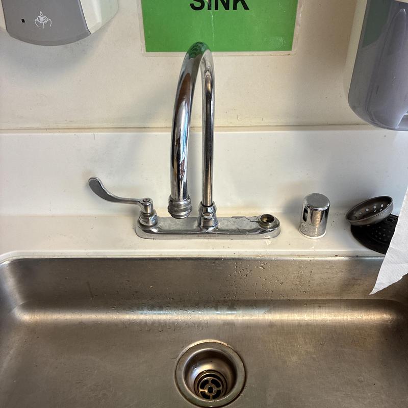 Kitchen faucet with valve stem replacement near sink