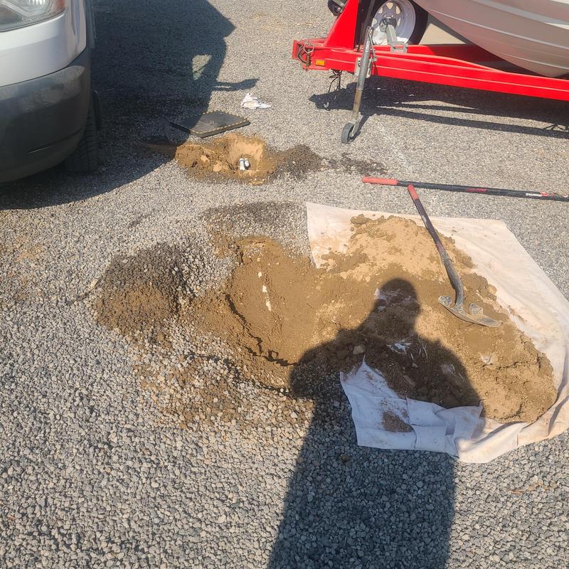 PVC water service pipe with excavation and tools