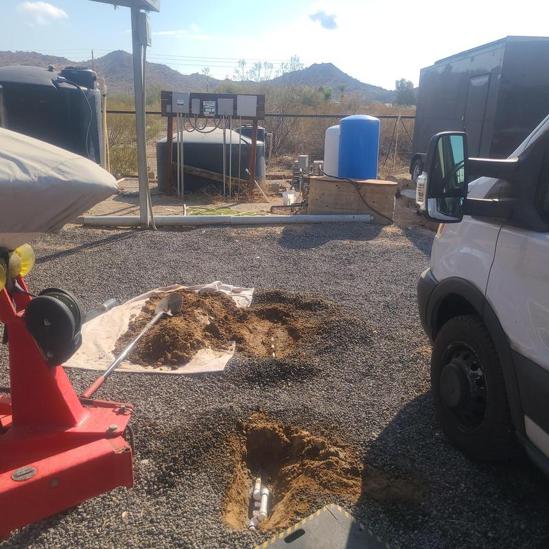 PVC water service line excavation and repair site