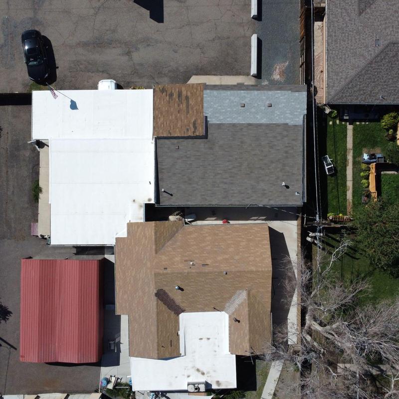 Shingle roof with multiple layers and tie-in points Shingle roof with multiple layers and tie-in points