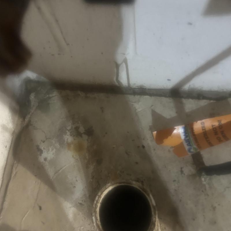 Sewer main line opening with pipe snaking tool