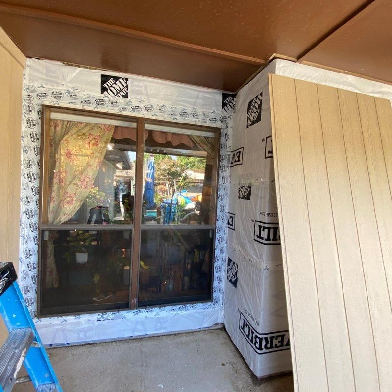 LP SmartSide siding installation with vapor barrier and flashing tape