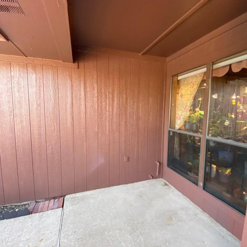 LP SmartSide siding and trim on back patio wall