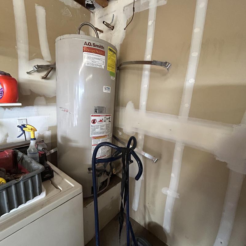 Water heater installation with new valve and expansion tank