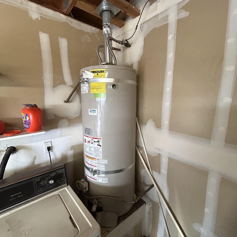 40 gallon water heater installation in utility room