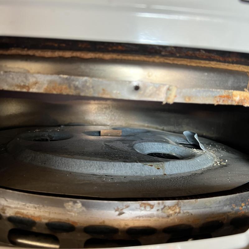 Bradford White water heater burner close-up inside tank