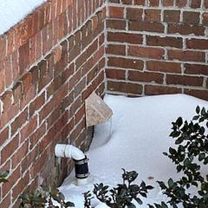 Frozen discharge pipe with temporary garden extension