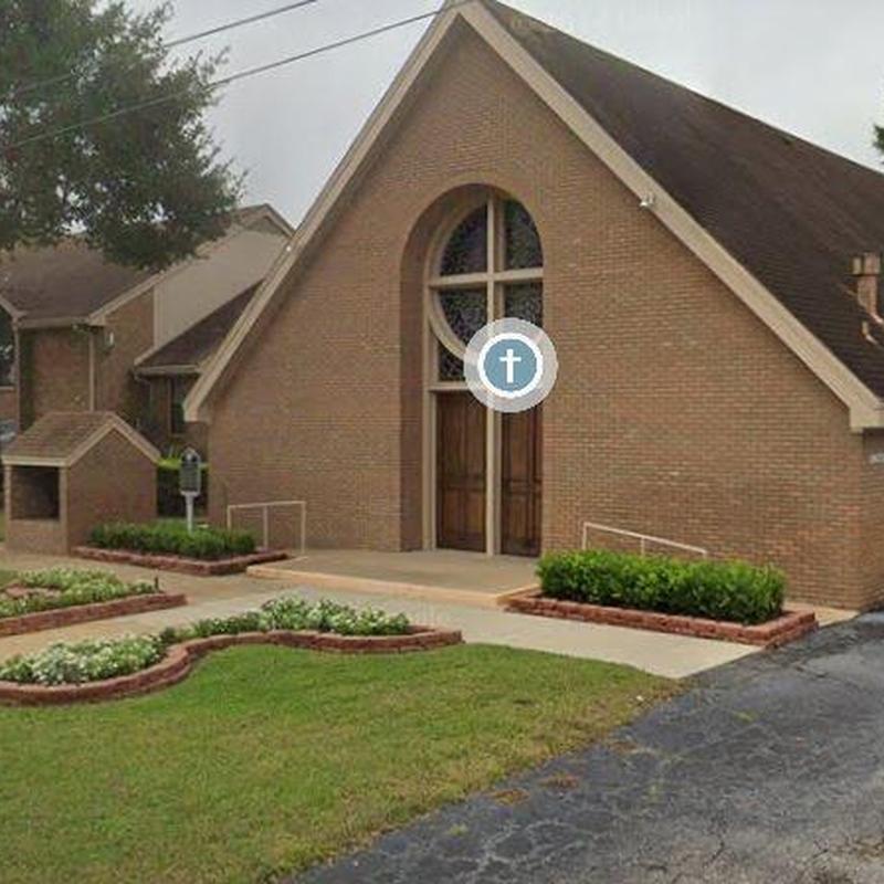 Roof and gutter system on church building exterior