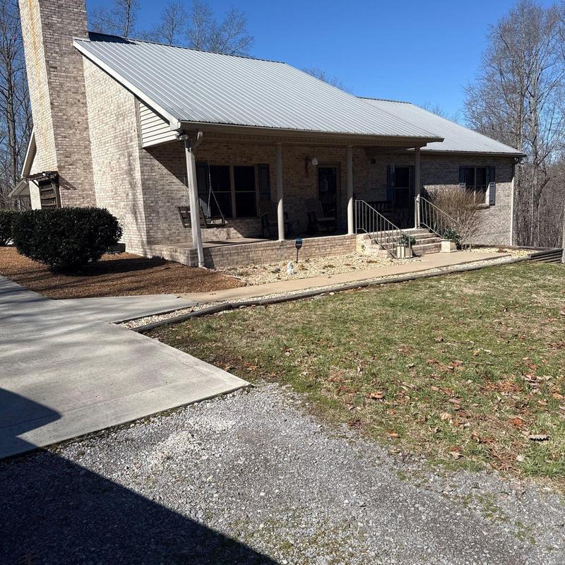 Metal roof inspection and hail damage assessment