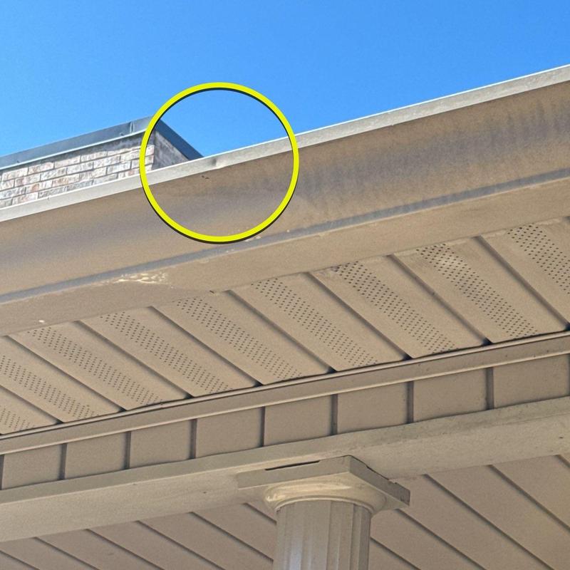 Gutter edge with minor damage circled in yellow