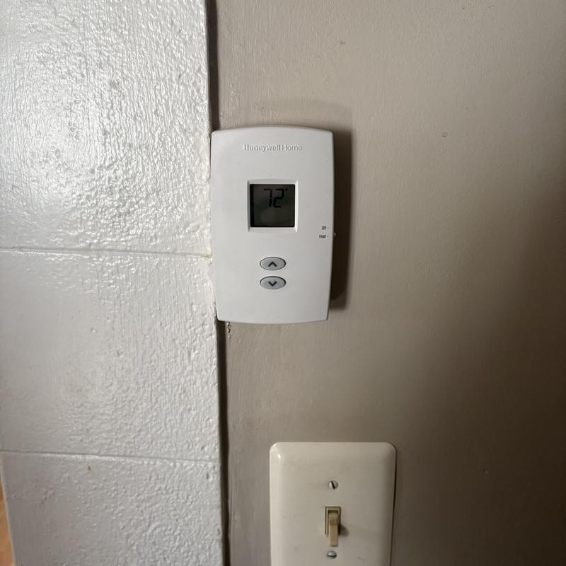 Digital thermostat installation on sunroom heating system
