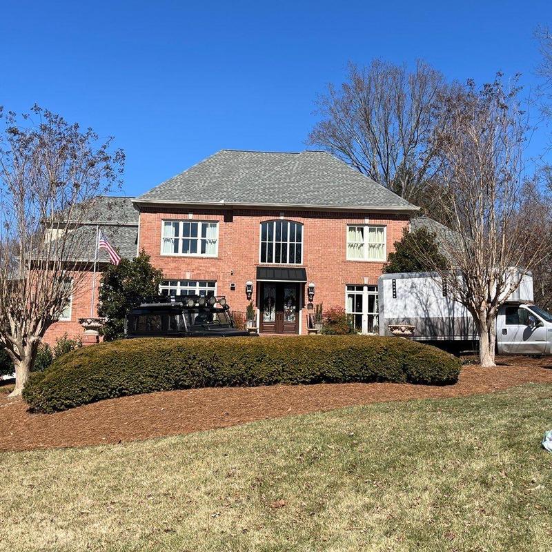 Asphalt shingle roof with hail damage inspection