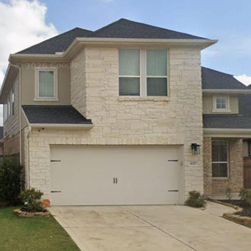 Asphalt shingle roof and stone exterior inspection