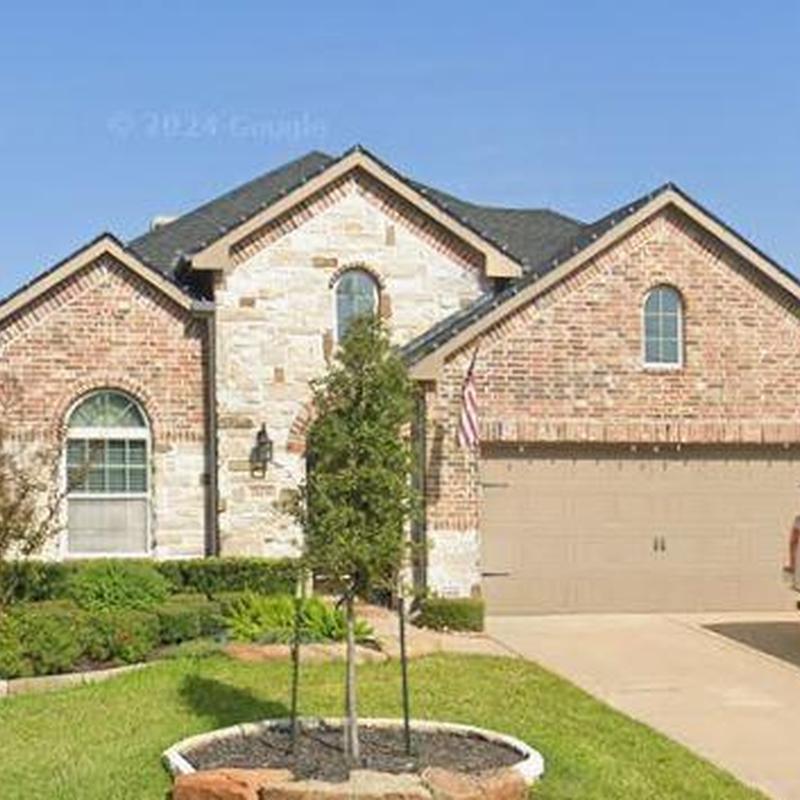 Asphalt shingle roof inspection on suburban home in Katy TX