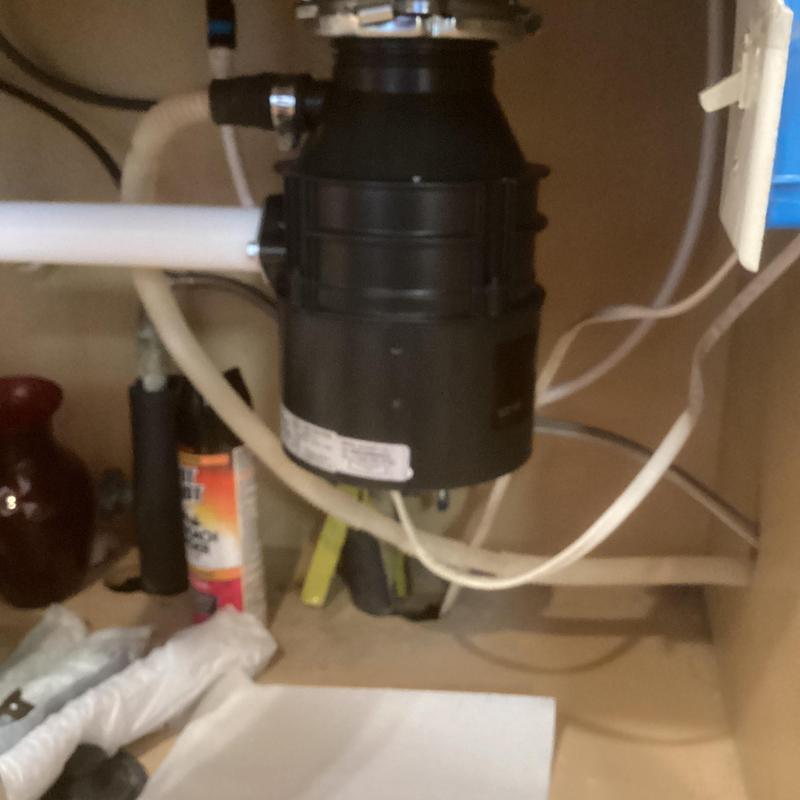 Insinkerator garbage disposal installation under sink