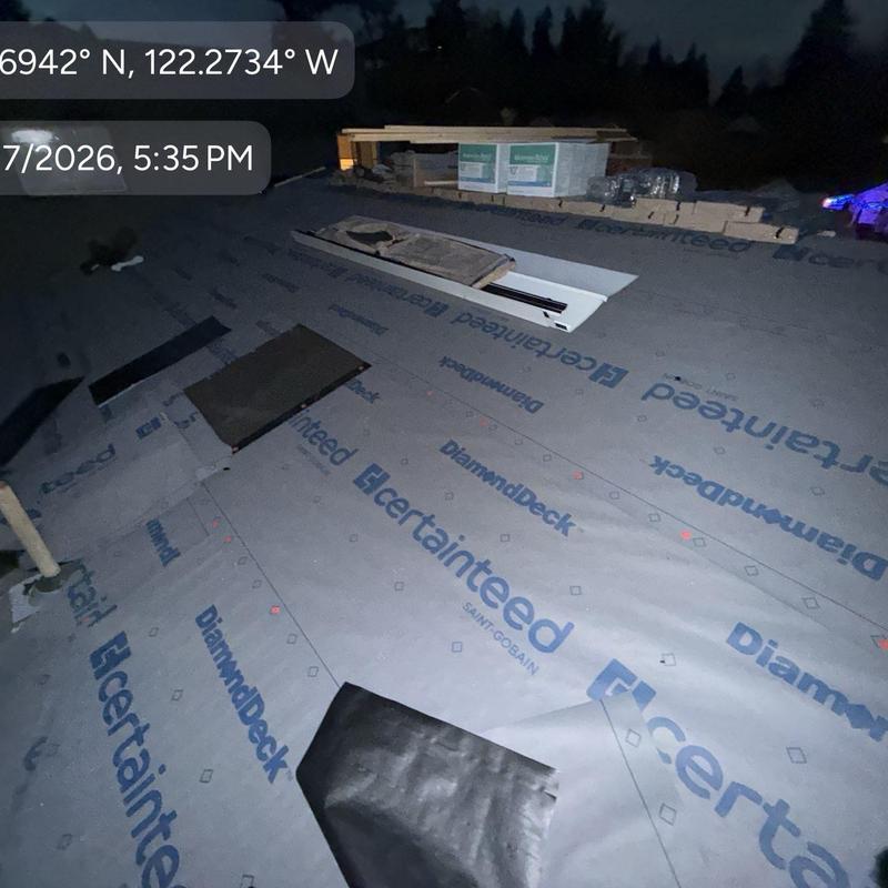 Roof underlayment installation with decking panels