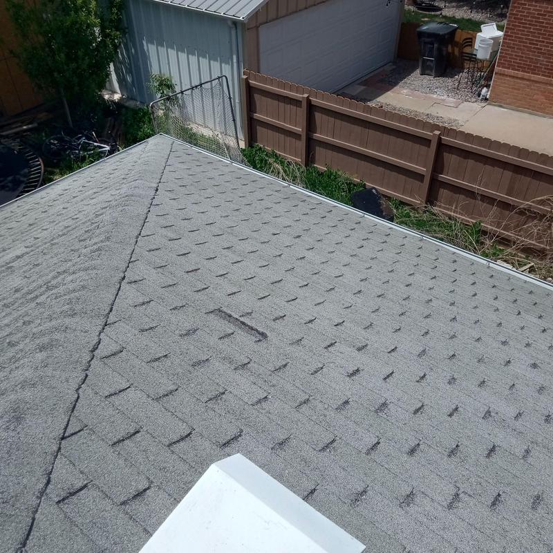 3-tab shingle roof with light wind damage and repairs 3-tab shingle roof with light wind damage and repairs