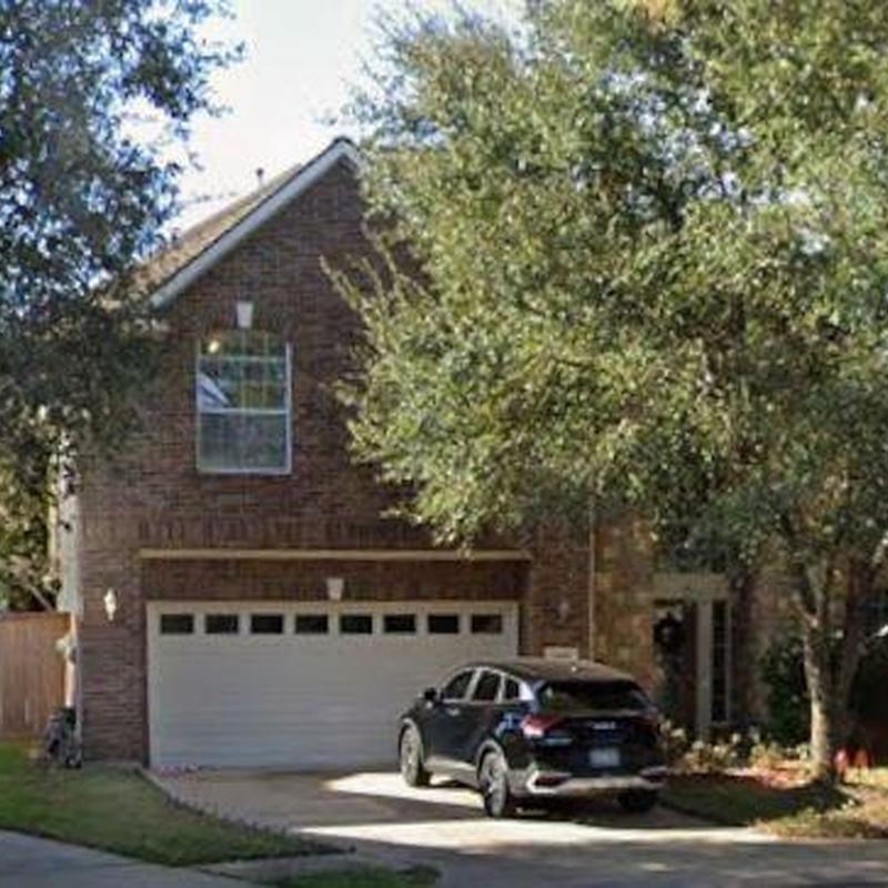 Garage door inspection at residential home in Katy, TX