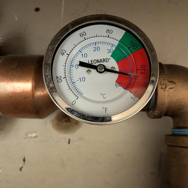 Indirect heat exchanger temperature gauge on copper pipe