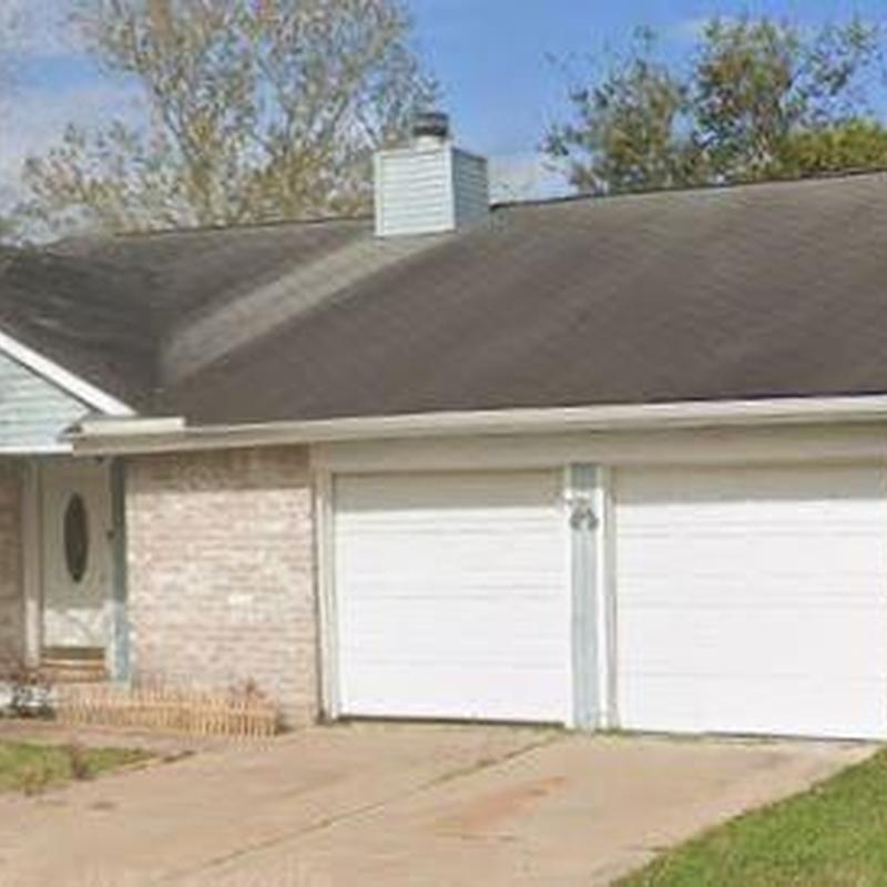 Asphalt shingle roof with chimney, residential home in Katy TX