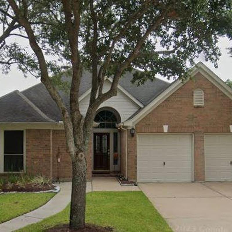 Asphalt shingle roof inspection at suburban home