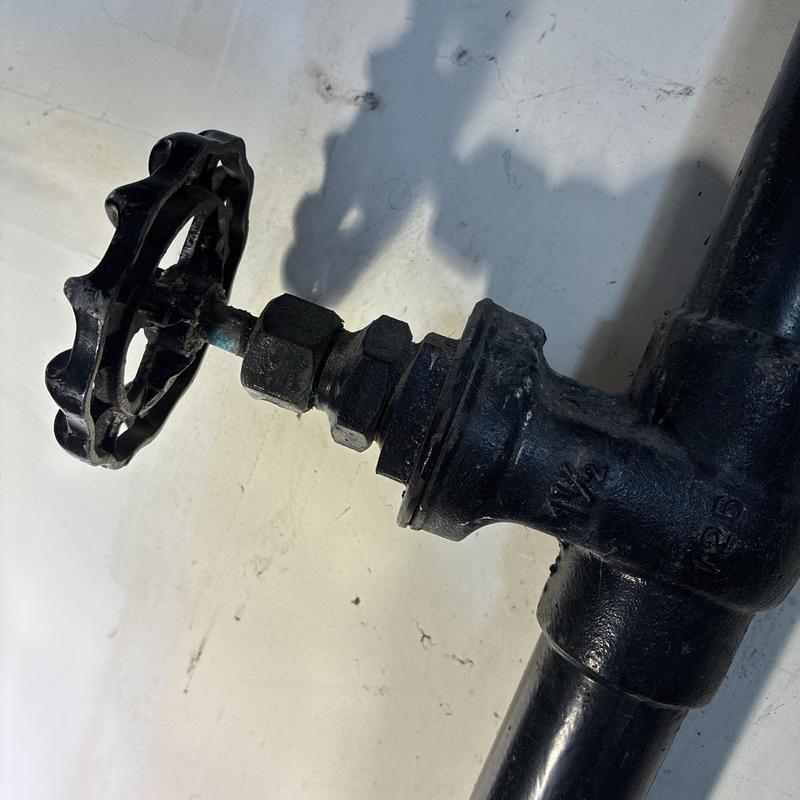 Black iron water shutoff valve with handwheel control