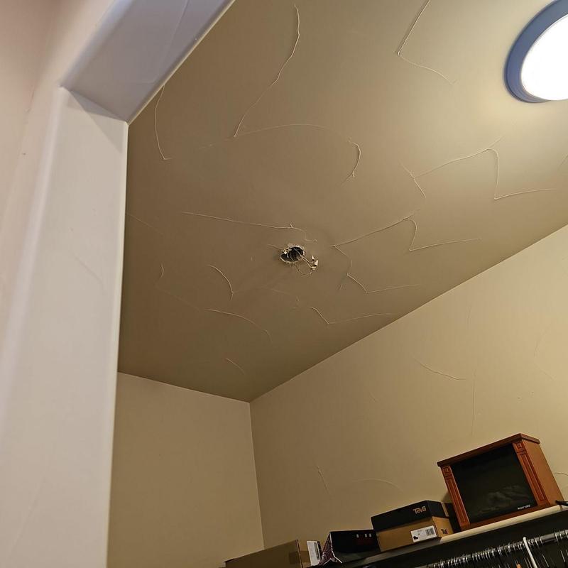 Ceiling drywall hole with textured finish in closet Ceiling drywall hole with textured finish in closet