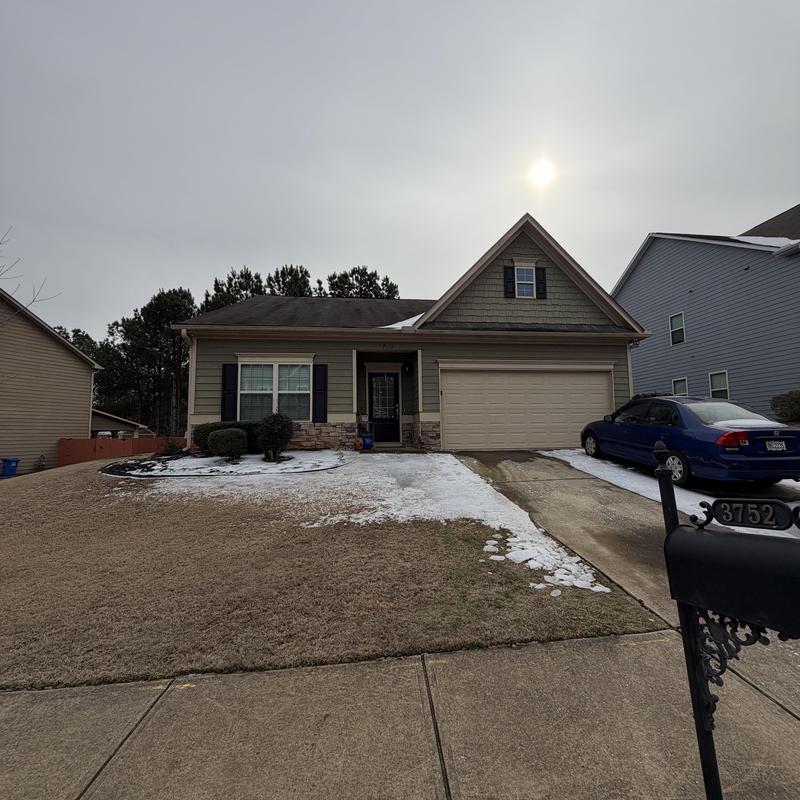 Ice dam on 3-tab roof causing leaks, Loganville, GA