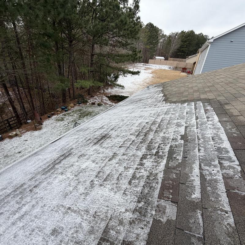 3-tab shingle roof with ice dam buildup