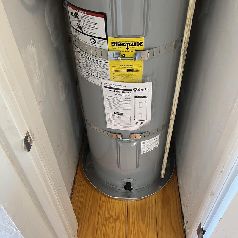 Electric water heater installed with mixing valve
