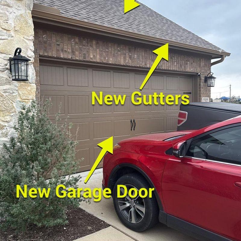 Garage door and gutters with new installation