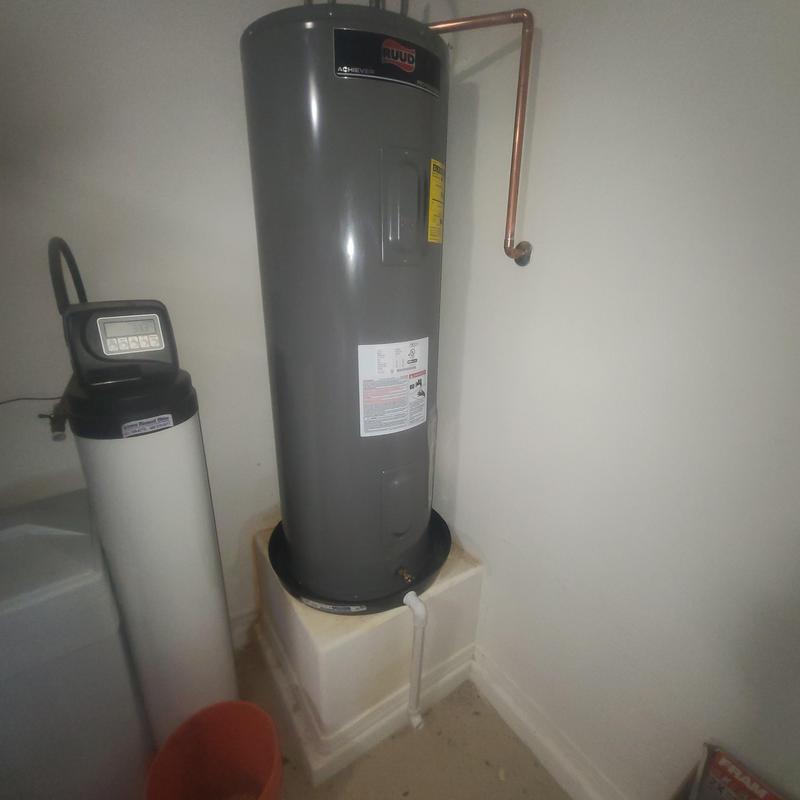 Electric water heater with new copper piping installation