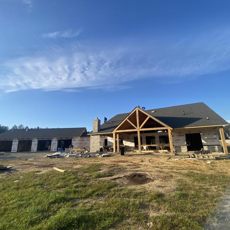 Architectural shingle roof on new construction with porch Architectural shingle roof on new construction with porch