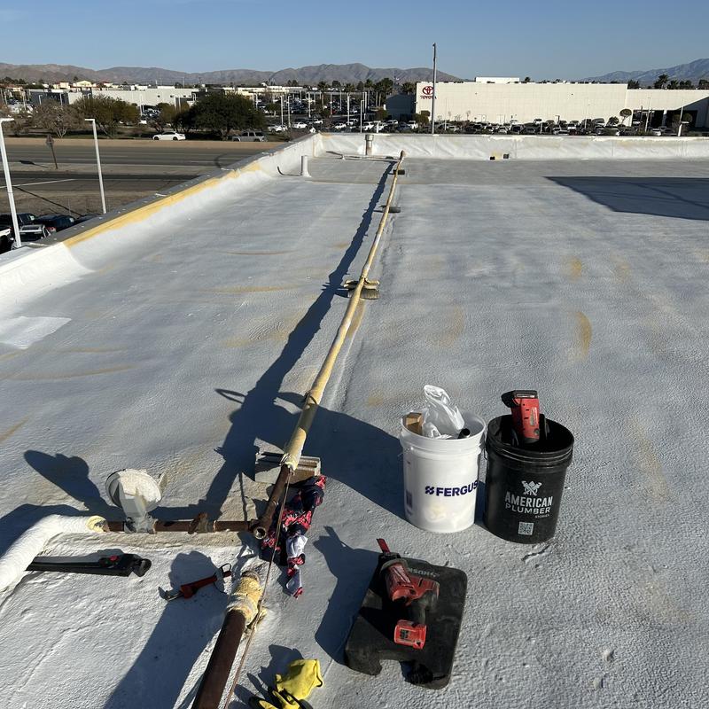 1-inch gas line on roof with tools and fittings