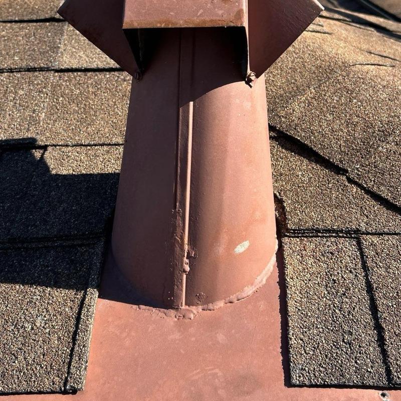 Roof vent flashing on asphalt shingle roof inspection